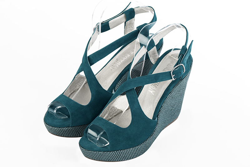 Peacock blue women's open back sandals, with crossed straps. Round toe. Very high wedge soles. Front view - Florence KOOIJMAN